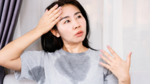 Middle age Asian Woman perspiring