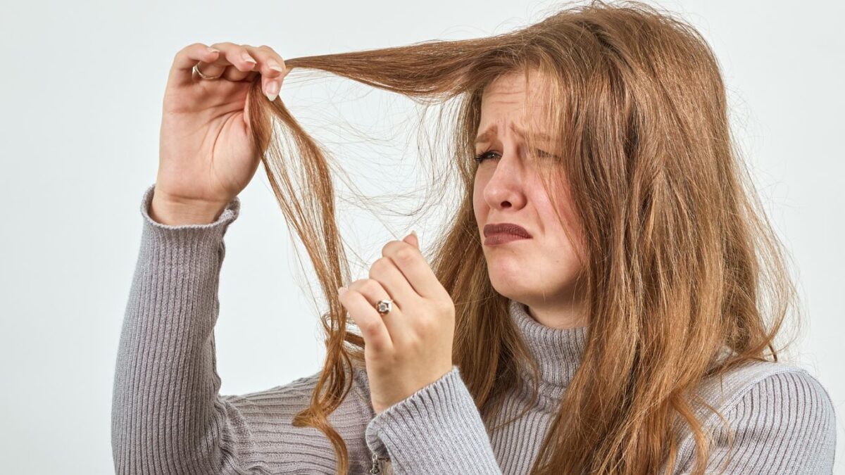 Middle age woman Battling Brittle Hair