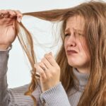 Middle age woman Battling Brittle Hair