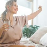 Woman waking up rejuvenated