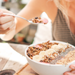 Woman eating healthy breakfast.